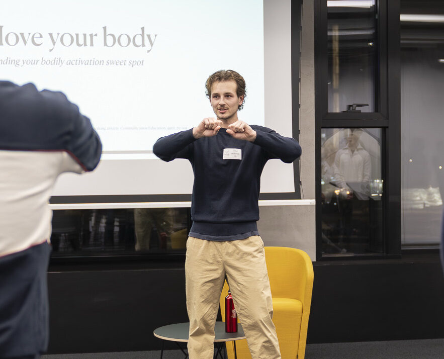 WillpowerLab's founder leading a 'Move your body' workshop session